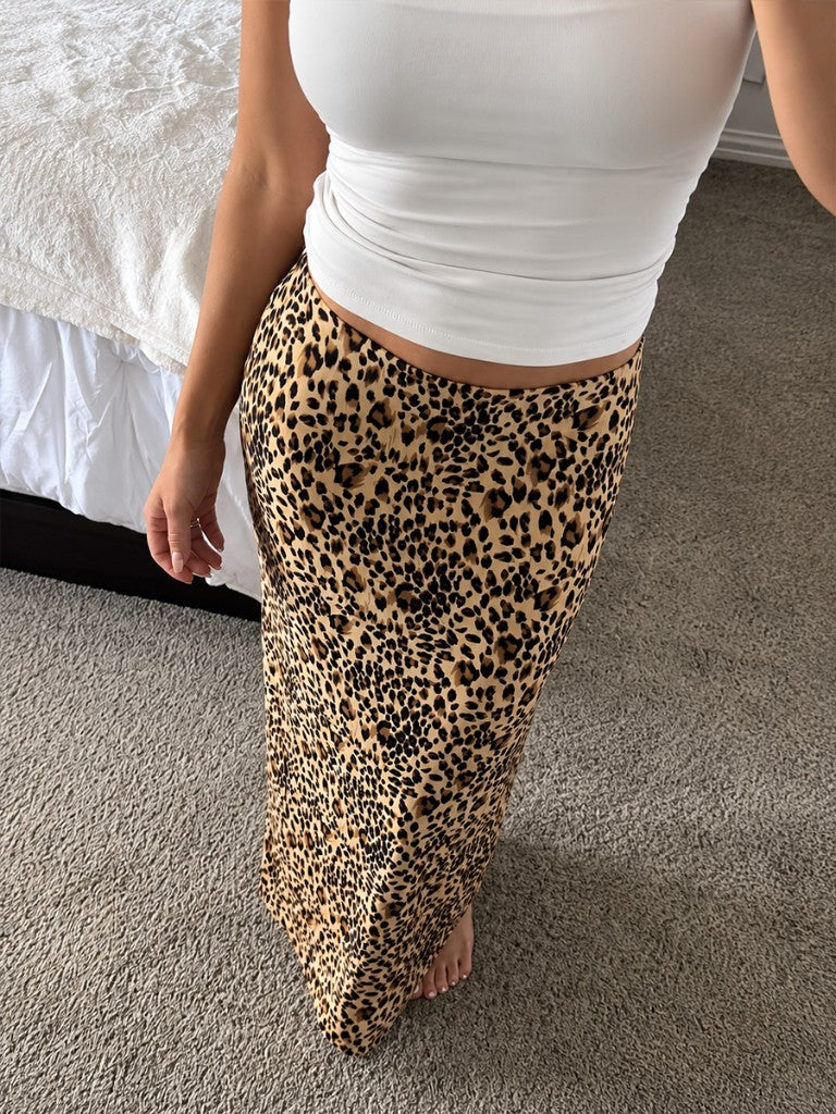 A sewn ALTR HOUSE leopard maxi skirt with minimal flare